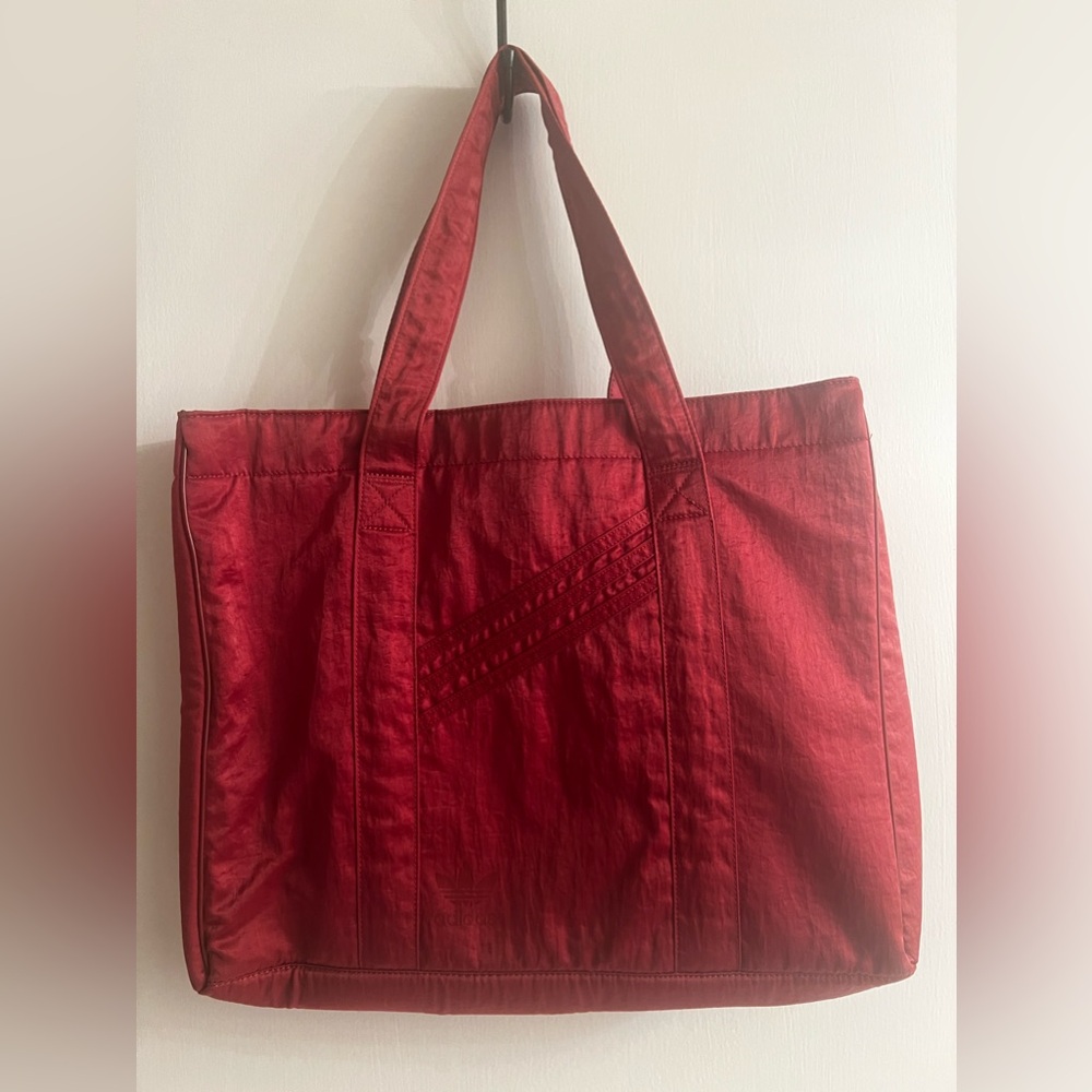 Adidas shopping bag tote in a burnt orange reddish color